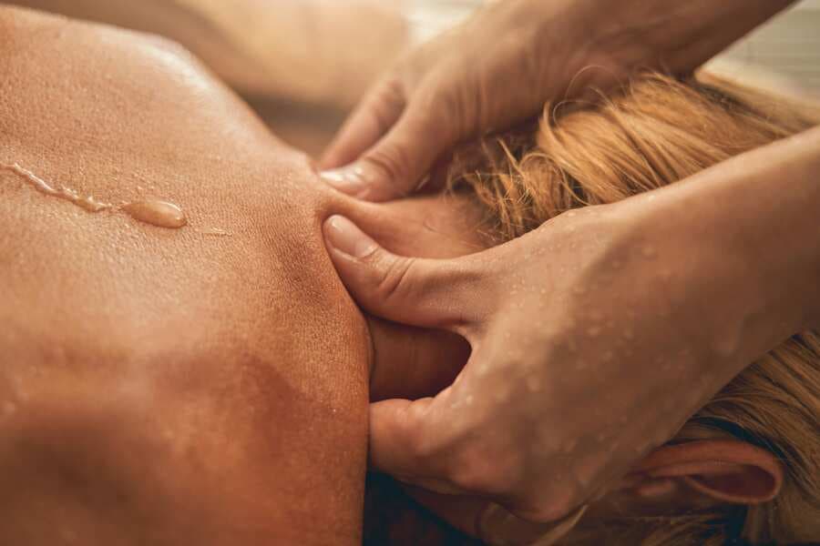 Remedial massage on the neck and shoulder